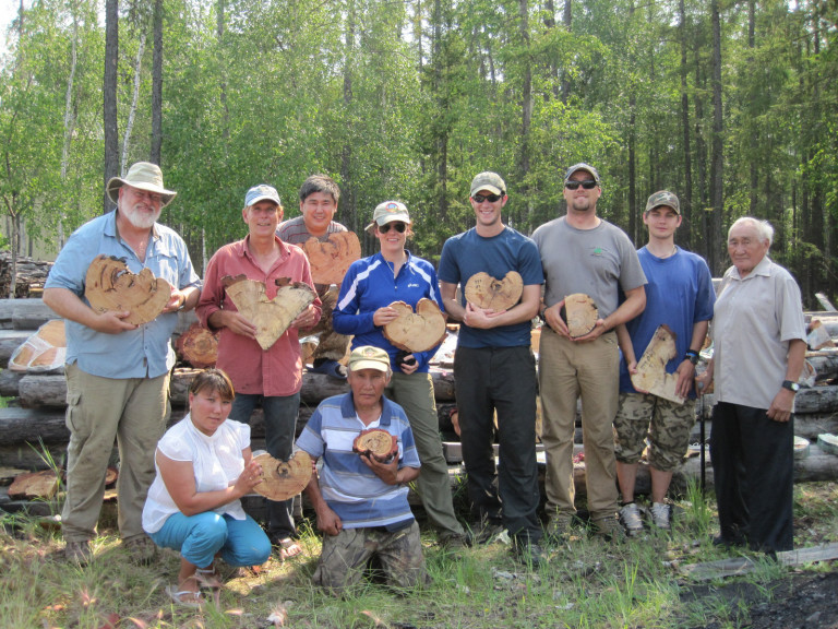 Group photo, holding cross-sections.