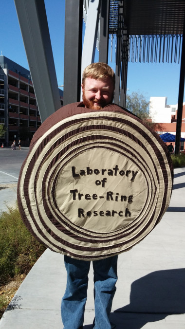 Volunteer in the tree-ring costume at a Tucson Festival of Books open house event.